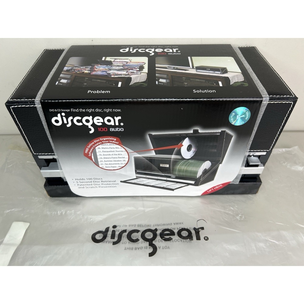 BRAND NEW Discgear 100 Auto CD / DVD Disc Storage Retrieval System Faux Leather